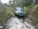 1992 Ford Explorer - This 1992 Ford Explorer navigates a challenging muddy off-road path.