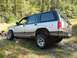 1992 Ford Explorer - This 1992 Ford Explorer is shown off-road with a two-tone paint scheme and lifted suspension.