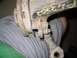 1999 Volkswagen Beetle - A close-up view of a vehicle's suspension part, showing rust and yellow markings.