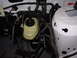 1995 Ford Taurus - Engine bay view showing brake fluid reservoir and wiring harness.