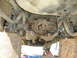 1984 Ford LTD - Underside view shows the rear axle, differential, and exhaust system of a vehicle.