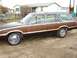 1984 Ford LTD - This station wagon features wood grain paneling along its side, with a slightly open hood.