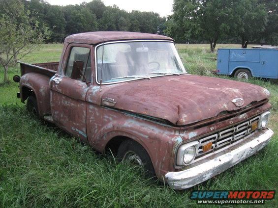 Rusty 1966 Ford F-250 pickup truck, 3q-front view