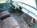 1966 Ford F-250 - The interior of a vintage truck shows significant wear and tear on the seats and dashboard.