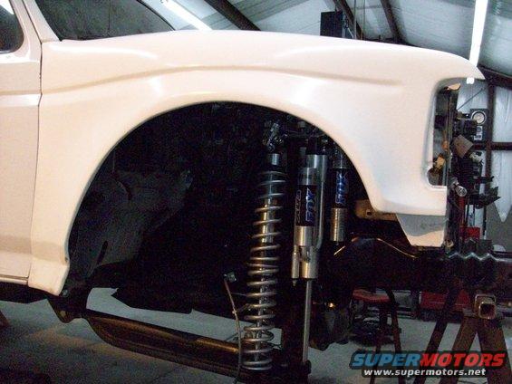 White 1996 Ford Bronco front fender and suspension with Fox shocks