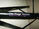 1990 Ford Bronco - Close-up of a black metal stand the "On-Stage Stands" logo.