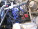 1986 Ford Bronco - moved coil from under a/c compressor to where the air filter housing used to be.