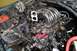 1996 Ford Bronco - Engine bay of a 1996 Ford Bronco showing the V8 engine and associated components.