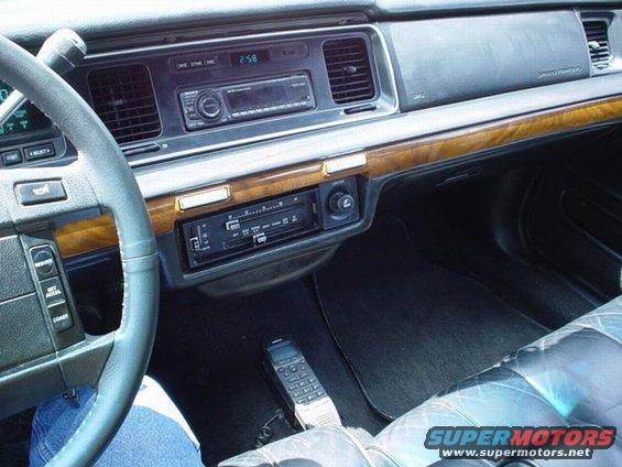1992 Mercury Grand Marquis interior showing dashboard, steering wheel, and center console with radio