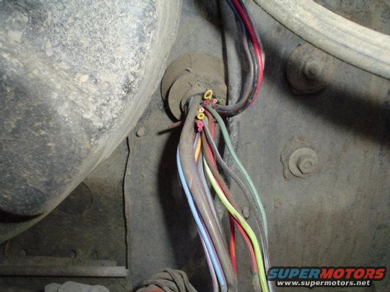 dsc00169.jpg If your not the "backup type of person" remove your stock ignition and cut every single wire going to it.(not responsible for you cutting any drivers side light wires... unravel the covering first!!)