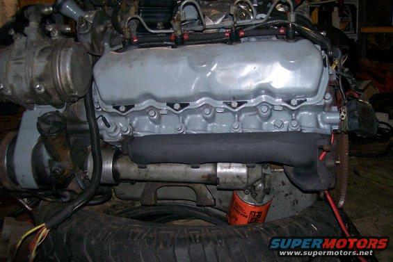 100_3290.jpg Got the exhaust manifolds painted and switched over.