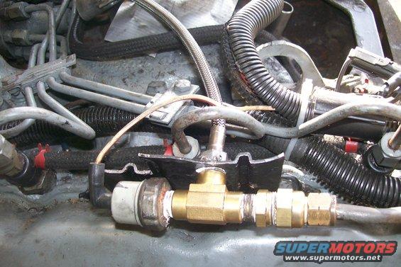 This was another bracket I had to make that came with the kit originally.  I hooked up my factory sending unit here and ran my mechanical gauge of the back of the engine.