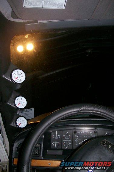 1992 Ford C-350 (Centurion Conversions) dashboard with three aftermarket gauges and stock instrument cluster