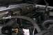 1992 Ford C-350 (Centurion Conversions) - Close-up view of an engine bay, focusing on the engine components and associated hoses.
