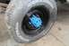 1997 Ford Ranger - Close-up of a tire and wheel assembly a bright blue hub and a Goodyear Workhorse radial tire.
