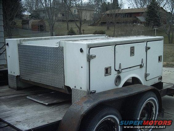 30964780005_large.jpg  I picked up a utility box/service body to use on it. I kept flip flopping on if I should use it or lengthen the stock stepside box. I decided to give up some style for some utility. But I am going to add some Ford style to it. I'm going to modify it to use the stock 54 style tailgate and do a little fiberglass work and flush mount the 53-56 shield style Ford tail lights. 

( Plans have changed, I sold this box.  I am going to use a stock style stepside box or a flatbed. ) 