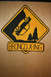1970 Mercury Cougar - A hand-painted sign warns of Bronco crossings with a car in distress.