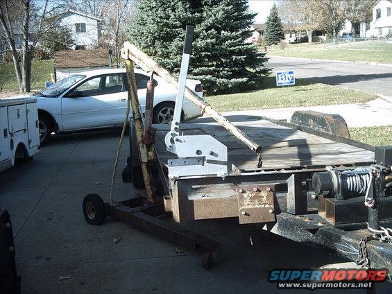 3096478_145_full.jpg 10-31-08: Thanks,

Here's today's progress.

I started out by pulling out the shear. I marked and drilled a couple holes on the cross bar on the front of my trailer. Then I bolted the shear onto the trailer ( I unbolted it when I was done with it  ).