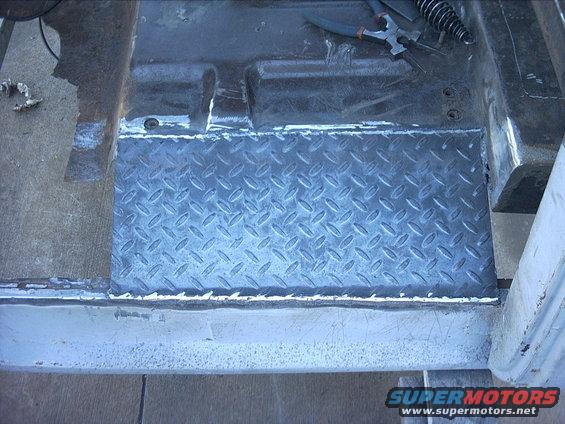 3096478_149_full.jpg 10-31-08:   I went over the weld beads quick with the grinder to clean them up a little. I'm going to smooth them out a little more once all the floors are in.