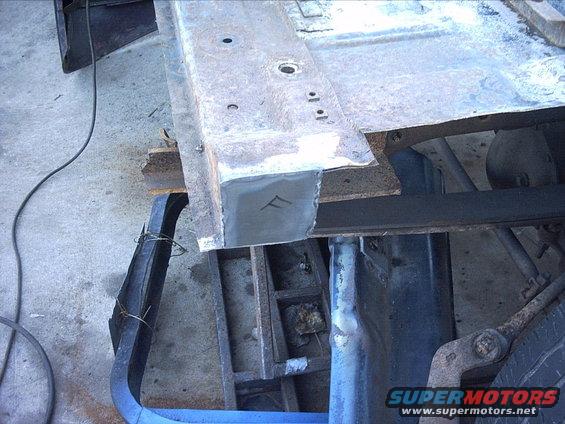 3096478_98_full.jpg 10-16-08:  Today I did some work on the floor.

I started out cleaning up the ends of the floor with the grinder. Then I made up a template for the patch plates. Then I cut them out of the same plate I used on the inner rockers. Then I sprayed the backs with weld thru primer. Then I welded them in.