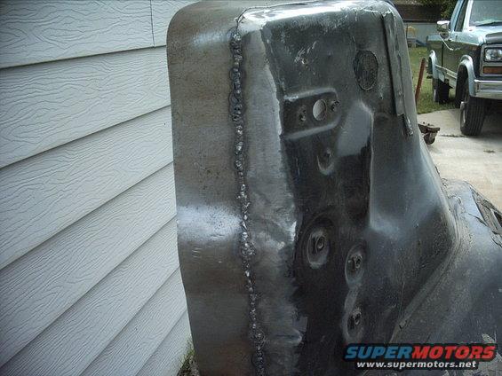 30964780262_large.jpg 5-25-09: I haven't done a whole lot of welding on sheet metal. I set up my welding according to the chart under the lid. Then I tried to do a few tack welds. I kept blowing thru the metal. So I turned the voltage setting down to the lowest setting ( was on the second to lowest setting ) . I tried again and it worked much better. So I started doing a bunch of tack welds moving to different areas for each tack until I had a solid bead. It might not look too pretty but that's what they make grinders for! :lol: