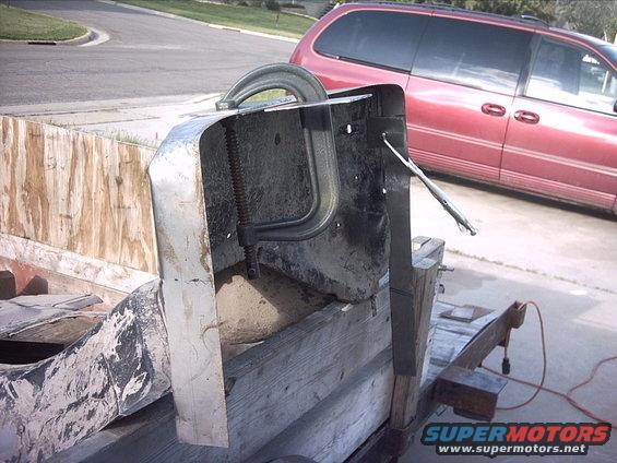 30964780256_large.jpg 5-17-09: After I pulled all the gauges back out and put them away I marked out the other panel for the extension for the firewall recess. Then I started to form it to fit. It's still really rough. I need to do more shaping, trimming then finally weld them in place.