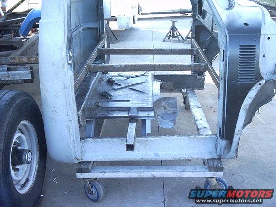 3096478_130_full.jpg 10-29-08: Once the primer dried I set the floor back in the cab for the final time. I measured, squared it up and then welded the floor to the rear crossmember ( just a couple plug welds for now ) . :D This wasn't anything big but I've been waiting a long time to do this! :-D

I ordered a new hand shear from Woodward Fab a while back. I'm going to give it a work out this week! I've got a lot of diamond plate steel to cut for the floor. I'm going to try and get the floor and firewall recess done by the end of this weekend. I want to get the cab structure finished before I have to put the cab in storage for the winter.