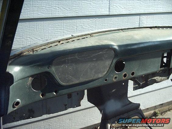 30964780250_large.jpg 5-11-09: Next I cut out a piece of aluminum to use for the instrument cluster. Did some test fitting made some minor adjustments more test fitting. Finally I was pretty happy with the fit.