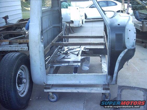 3096478_141_full.jpg 10-30-08:  Then I cut out the floor for the transmission tunnel.