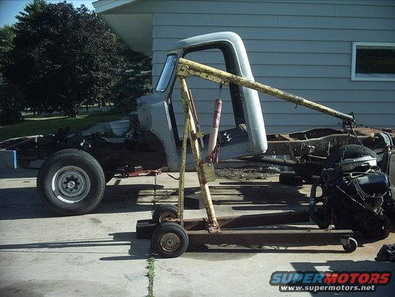 3096478_34_full.jpg 7-09-08: I pulled the fenders back off and slid the cab back to make it easier to work on the engine and transmission. Can you say goodbye 400?