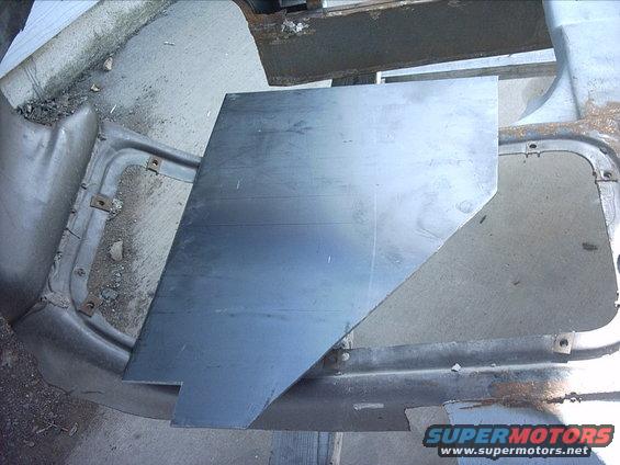 30964780222_large.jpg 4-15-09:   My plan to take care of this is to weld in some 10 gauge steel plate. :D  This will add strength and give me something solid to weld the front floors and the replacement front cab mount braces to.  So I grabbed a couple sheets of tag board/poster board (whatever you want to call it ) and made a couple templates. I transferred the templates onto a 2' x 4' sheet of 10 gauge steel. Then I cut it out with a jigsaw. Cutting 10 gauge steel with a jigsaw takes forever!  :black_eye: :mat:   I'm going to cut some windows out of these plates so I can get into the areas if I need to. I'll add some trim pieces to cover the holes. I had to cut a big notch out of the passenger side plate to clear the fresh air vent for the heater.
