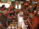 1993 Ford Bronco - Friends gather for a meal and drinks at a Hooters restaurant, with televisions showing sports in the background.