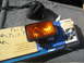 1986 Ford Bronco - A Pro Comp off-road light and wiring kit are shown on top of a product box.