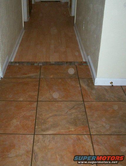 cropped-pic-tile-foyer-and-laminate-hall.jpg 