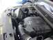 2008 Nissan Titan - The engine compartment of a Nissan Titan is visible, the 5.6L V8 engine.