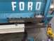 1972 Ford Bronco - Welding a patch onto the lower section of a Ford truck's tailgate.