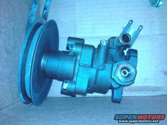 Power steering pump with a two-groove pulley attached, dark metal finish