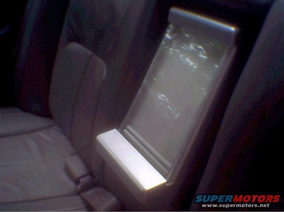 photo1.jpg here's the fountain installed in my backseat where the armrest used to be. turns girls in to rabbits in 3 seconds flat.