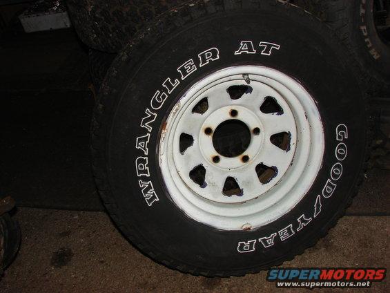 Goodyear Wrangler AT tire on white rim