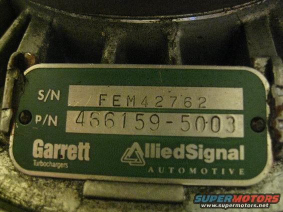 Garrett turbocharger plate with S/N FEM42762 and P/N 466159-5003