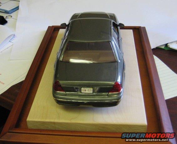 Model of a 1999 Ford Crown Victoria on a wooden base