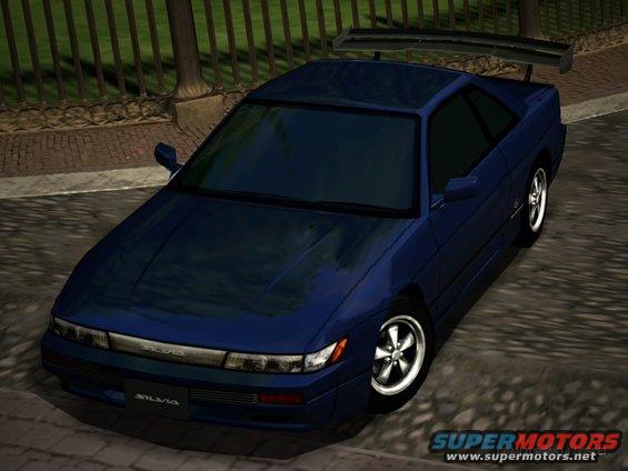 Blue coupe with a large rear spoiler and 'SILVIA' badging