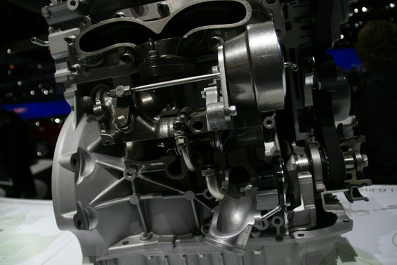 Cutaway view of an engine showing internal components and a turbocharger