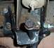 1990 Ford Bronco - A close-up of the above shot. Note the hole to the left is where the hanger originally WAS; my grinding and cutting netted me about 1" forw…