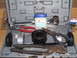 1991 Ford Bronco - Toolbox containing various hand tools and a small jar of petroleum jelly.