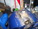 1991 Ford Bronco - A vehicle part, likely a universal joint, is secured in a vise for repair or inspection.