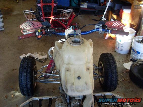 1987 Honda 250 R ATV front view, showing handlebars, fuel tank, and front wheels