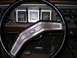1978 Ford Bronco - The interior of a 1978 Ford Bronco features wood grain accents and a classic dashboard layout.
