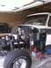 1978 Ford Bronco - This 1978 Ford Bronco is in a garage with its front end disassembled for work.
