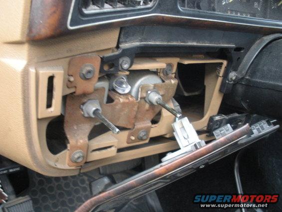 Disassembled steering column assembly with exposed metal components and wiring
